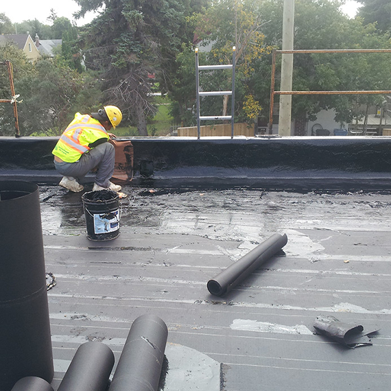 New 4-ply felt membrane installation