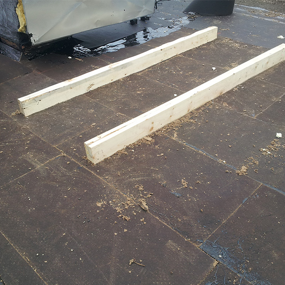 Sleeper installation during commercial roof repair Winnipeg